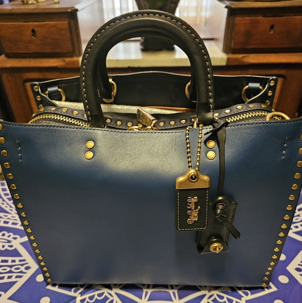 COACH ROGUE WITH RIVETS NEW